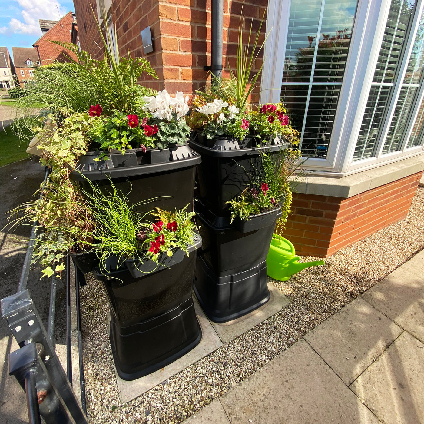 270 litre water butt with planters for front of house or patio.